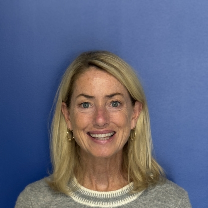 Color photo of Colleen Hackett who is the owner and President of Fastest Labs of Melrose Park